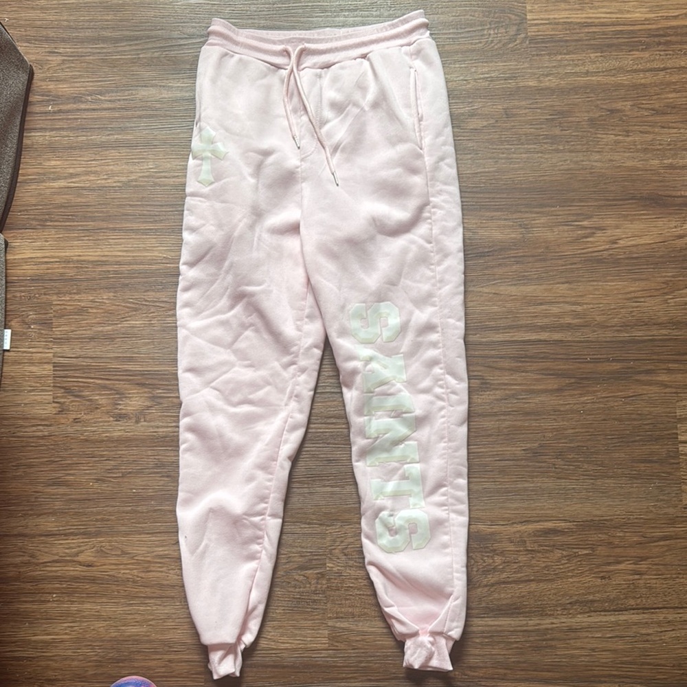 Unisex pink saint sweatpants. Size Medium.
